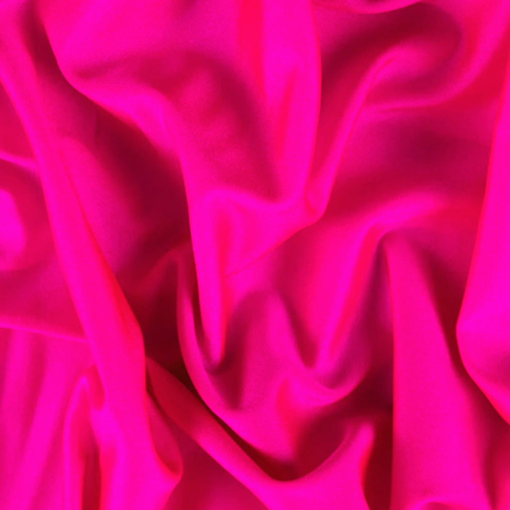 Bright hot pink fabric with a smooth, slightly lustrous texture, shown in soft draped folds filling the frame.