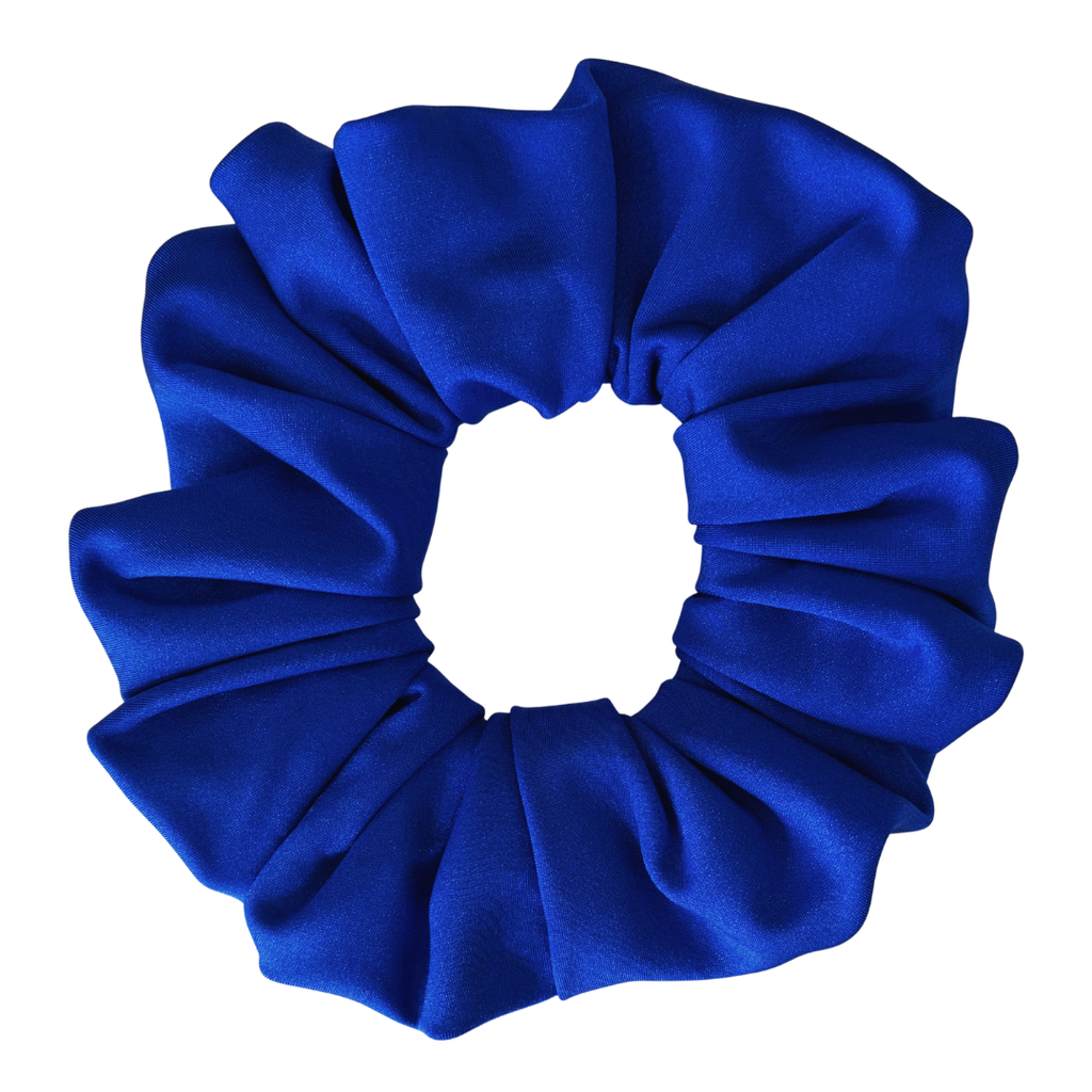 A single royal blue fabric hair scrunchie shown from a top-down view on a plain white background.
