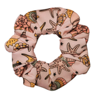 Scrunchie with starfish and shell pattern on a white background