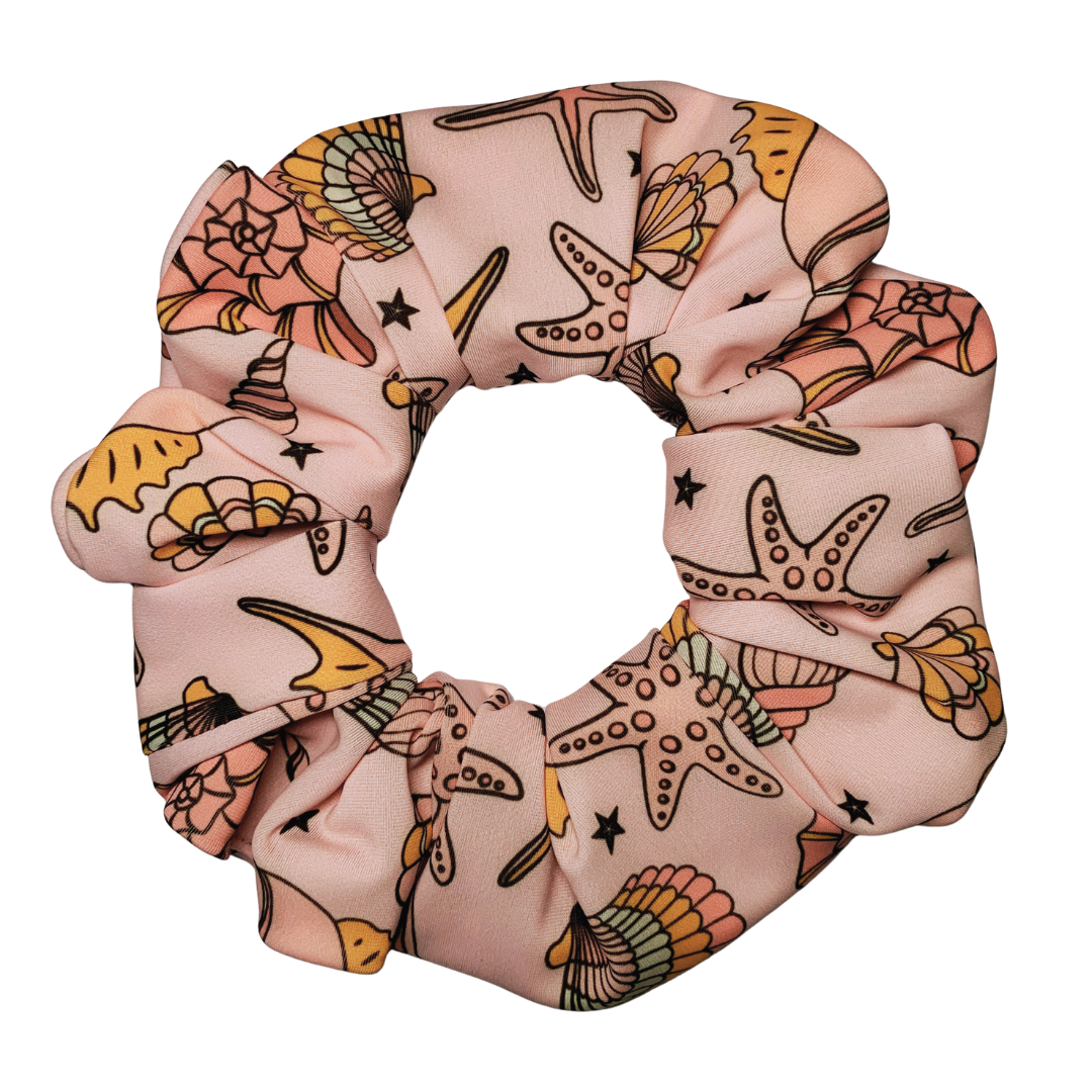 Scrunchie with starfish and shell pattern on a white background
