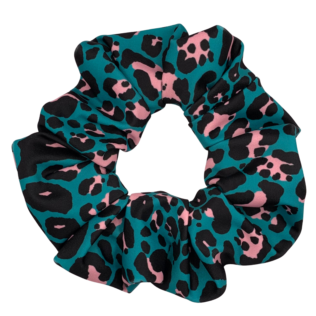 Teal swim scrunchie with pink and black leopard print pattern on a white background