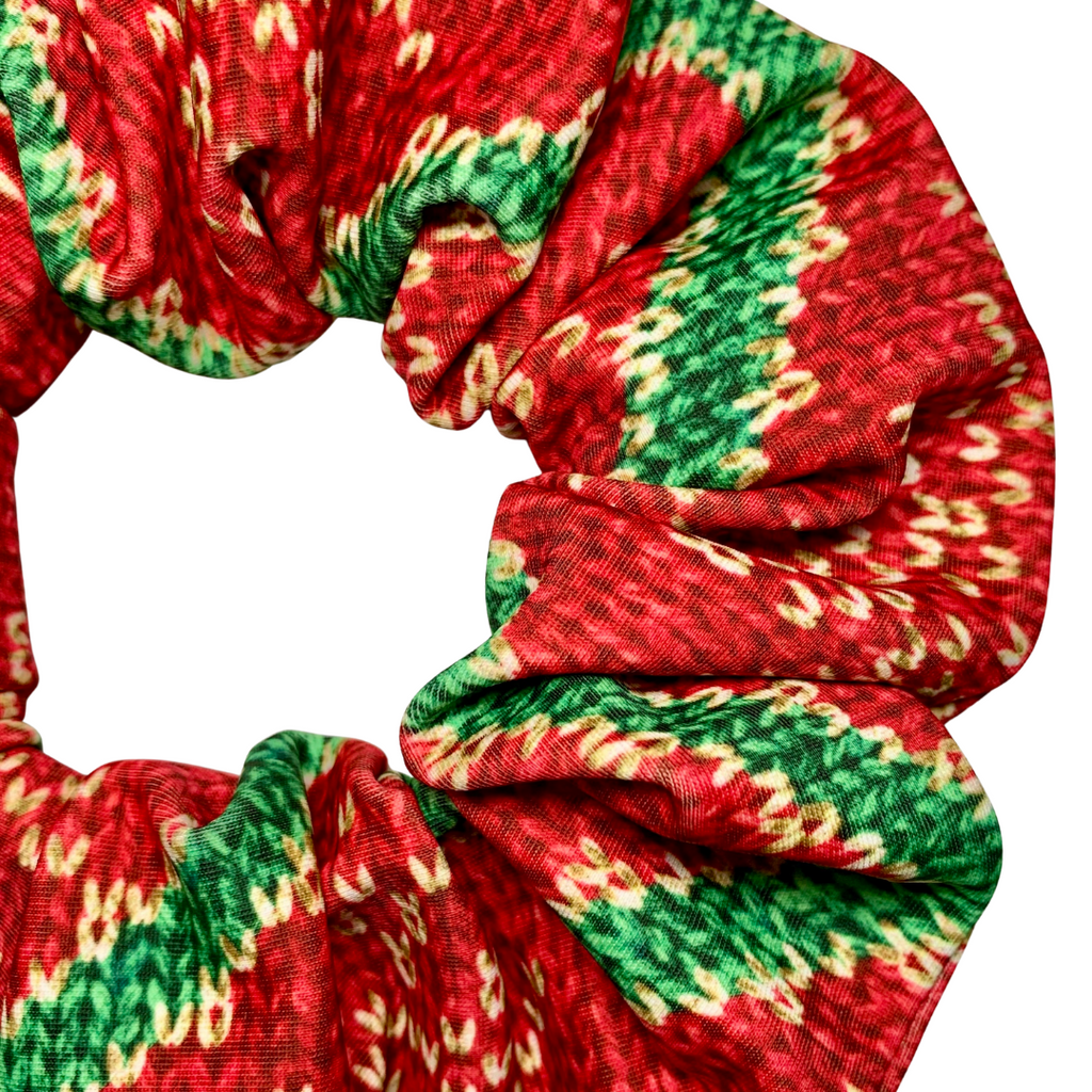 Red and green patterned scrunchie on a white background
