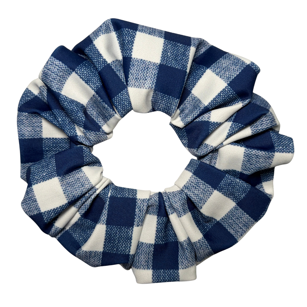 Blue and white checkered scrunchie on a white background