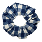 Blue and white checkered scrunchie on a white background