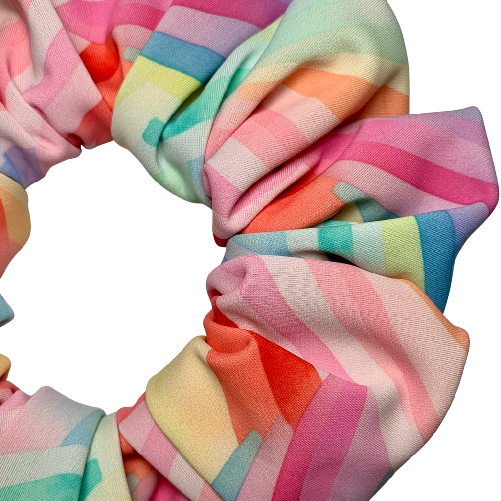 Multicolored striped scrunchie on a white background