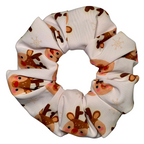 swim Scrunchie with reindeer pattern on a white background