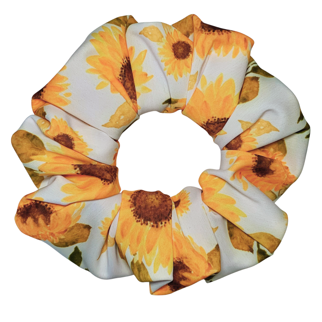 Sunflower patterned swim scrunchie on a white background